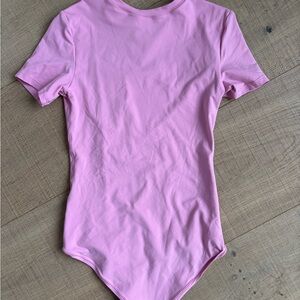 Pink bodysuit